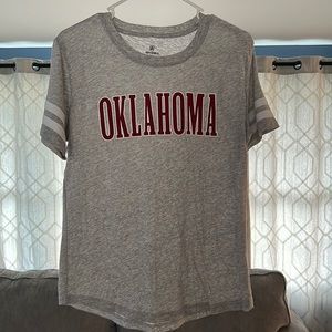 Never worn, no holes, no stains. Sports tee.